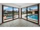 Bright bonus room with tile floors and stunning water views at 740 Old Compass Rd, Longboat Key, FL 34228
