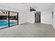 Bright interior room with tile flooring and pool view at 740 Old Compass Rd, Longboat Key, FL 34228