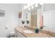 Clean bathroom with granite countertop, a large mirror, and shower at 7728 Rio Bella Pl, Bradenton, FL 34201