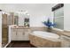 Primary bathroom with soaking tub and walk-in shower at 7728 Rio Bella Pl, Bradenton, FL 34201
