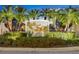 Entrance to the community of Riva Trace with lush landscaping at 7728 Rio Bella Pl, Bradenton, FL 34201