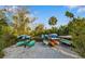 Community kayak storage area with various kayaks available at 7728 Rio Bella Pl, Bradenton, FL 34201