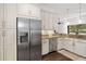 Modern kitchen with stainless steel appliances and granite countertops at 7728 Rio Bella Pl, Bradenton, FL 34201