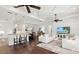 Bright and airy living room with hardwood floors and white sofas at 7728 Rio Bella Pl, Bradenton, FL 34201