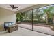 Spacious screened patio with seating area and views of the backyard at 7728 Rio Bella Pl, Bradenton, FL 34201