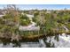 Elevated wooden deck overlooking a tranquil lake, offering scenic views at 7728 Rio Bella Pl, Bradenton, FL 34201