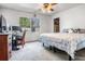 Bedroom featuring a large window, ceiling fan, and ample space for a desk and bed at 807 62Nd W St, Bradenton, FL 34209