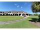 Community clubhouse with a relaxing view of the golf course at 8750 Olde Hickory Ave # 9205, Sarasota, FL 34238