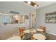 Dining area with kitchen pass-through and open layout at 8750 Olde Hickory Ave # 9205, Sarasota, FL 34238