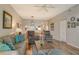 Living room with open concept to kitchen and dining area at 8750 Olde Hickory Ave # 9205, Sarasota, FL 34238