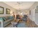 Living area featuring hardwood floors and comfortable seating at 8750 Olde Hickory Ave # 9205, Sarasota, FL 34238