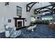 Elegant clubhouse lobby with fireplace, piano, and bar area at 8750 Olde Hickory Ave # 9205, Sarasota, FL 34238