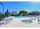 Resort-style pool and spa with comfortable seating at 8750 Olde Hickory Ave # 9205, Sarasota, FL 34238