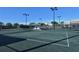 Well-maintained tennis courts with ample space at 8750 Olde Hickory Ave # 9205, Sarasota, FL 34238