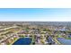 Community overview featuring houses, lakes, and landscaping at 8818 29Th E St, Parrish, FL 34219