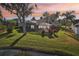 Home features a screened-in patio overlooking a pond at 8818 29Th E St, Parrish, FL 34219