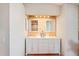 Double vanity bathroom with white cabinets and a marble countertop at 8818 29Th E St, Parrish, FL 34219