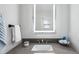 Bright bathroom featuring a sleek vanity and a large mirror at 8818 29Th E St, Parrish, FL 34219