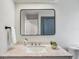 Bright bathroom featuring a vanity with a vessel sink and a large mirror at 8818 29Th E St, Parrish, FL 34219
