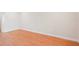 Simple bedroom with wood floors and neutral walls at 8818 29Th E St, Parrish, FL 34219