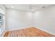 Bright bedroom with wood-look flooring and a window at 8818 29Th E St, Parrish, FL 34219