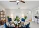 Dining area features a glass table and colorful rug at 8818 29Th E St, Parrish, FL 34219