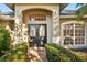 Elegant double front doors with sidelights and landscaping at 8818 29Th E St, Parrish, FL 34219