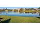 Serene community lake view with lush landscaping at 8818 29Th E St, Parrish, FL 34219