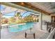 Inviting screened pool and patio with lake view at 8818 29Th E St, Parrish, FL 34219