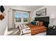 Cozy bedroom featuring a comfortable bed, ample natural light, and modern decor at 8956 Daybreak St, Sarasota, FL 34241