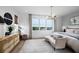 Spacious bedroom with large windows and stylish decor at 9985 Key Haven Rd, Seminole, FL 33777