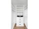 Well-organized closet with shelves, drawers, and hanging space at 9985 Key Haven Rd, Seminole, FL 33777