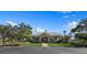 Community clubhouse with landscaping and a welcoming entrance at 9985 Key Haven Rd, Seminole, FL 33777