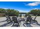 Fire pit with seating for enjoying evenings outdoors at 9985 Key Haven Rd, Seminole, FL 33777