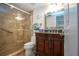 Clean bathroom, shower with grab bar, granite vanity at 1001 Benjamin Franklin Dr # 110, Sarasota, FL 34236