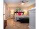 Spacious bedroom with ceiling fan and large windows at 1001 Benjamin Franklin Dr # 110, Sarasota, FL 34236