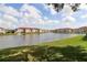 Community features lakefront property with lush landscaping at 1010 Villagio Cir # 207, Sarasota, FL 34237