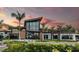 Stunning community center at sunset, showcasing modern architecture at 10157 Silent Night Ln, Sarasota, FL 34241