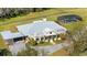 Aerial view of the home, pool, and grounds at 11701 Marsh Head Road, Sarasota, FL 34240