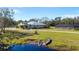 Aerial view of home, pool, and pond at 11701 Marsh Head Road, Sarasota, FL 34240