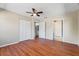 Spacious bedroom with wood floors and ceiling fan at 11701 Marsh Head Road, Sarasota, FL 34240