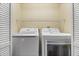 Laundry room with washer and dryer included at 11701 Marsh Head Road, Sarasota, FL 34240