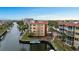 Aerial of condo building near waterway at 1215 S Portofino Dr # 108, Sarasota, FL 34242