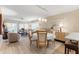 Bright dining area with round table and chairs, adjacent to kitchen at 1215 S Portofino Dr # 108, Sarasota, FL 34242