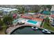 Community pool, shuffleboard, and boat docks at 1215 S Portofino Dr # 108, Sarasota, FL 34242