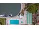 Top-down view of pool, shuffleboard, and docks at 1215 S Portofino Dr # 108, Sarasota, FL 34242