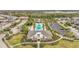 Aerial view of community pool, clubhouse, and surrounding homes at 12455 Trailhead Dr, Bradenton, FL 34211