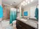 Bathroom with tub shower combo and granite vanity at 12455 Trailhead Dr, Bradenton, FL 34211