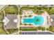 Aerial view of community pool with surrounding lounge chairs at 12455 Trailhead Dr, Bradenton, FL 34211