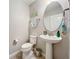 Clean powder room with pedestal sink and toilet at 12455 Trailhead Dr, Bradenton, FL 34211